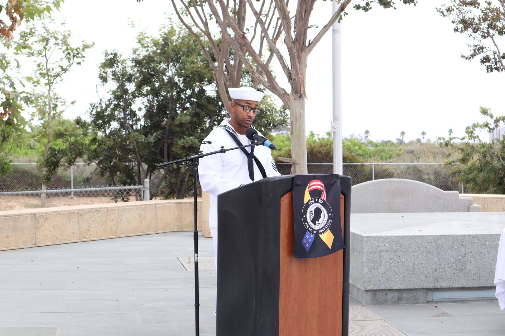 Hospital Corpsman 1st Class Trayvious Wilson, the Leading Petty Officer for the Naval Hospital Camp Pendleton Pharmacy, member of Expeditionary Medical Facility 150 Alpha, and member of the First Class Petty Officer Association, participates in the command POW / MIA Recognition Day ceremony on September 15, 2023.