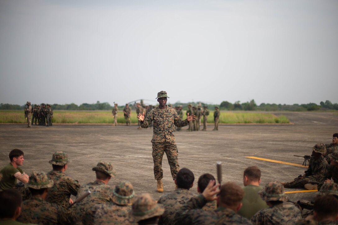 U.S. Marine Corps Lt. Col. Osman Sesay, commanding officer, 3d Littoral Logistics Battalion, 3d Marine Littoral Regiment, 3d Marine Division, gives a speech during Balikatan 23 at Cagayan Airfield, Philippines, April 20, 2023. Balikatan 23 is the 38th iteration of the annual bilateral exercise between the Armed Forces of the Philippines and the U.S. military. The exercise includes three weeks of training focused on amphibious operations, command and control, humanitarian assistance, urban operations and counterterrorism skills throughout northern and western Luzon. Coastal defense training figures prominently in the Balikatan 23 training schedule.  (U.S. Marine Corps photo by Cpl. Eric Huynh)