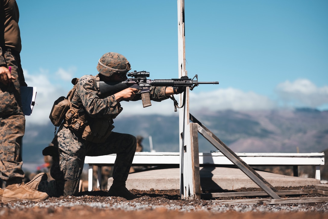 A U.S. Marine with 3d Littoral Combat Team, 3d Marine Littoral Regiment, 3d Marine Divison, aims down range during a short distance live-fire range at Pohakuloa Training Area, Hawaii, Oct. 8, 2023. Prior to participating in Joint Pacific Multinational Readiness Center Exercise from Oct. 26 – Nov. 9, a company of Marines with 3d LCT is conducting the final phase of their training work-up cycle on the Big Island, Hawaii.