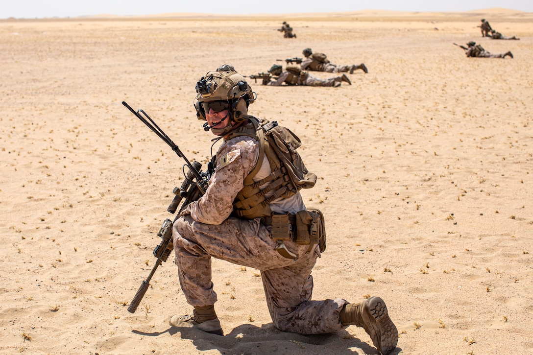 U.S. Marine Corps 1st Lt. Jaret Ulibarri, a platoon commander with Alpha Company, Battalion Landing Team 1/6, 26th Marine Expeditionary Unit (SOC), leads an integrated platoon during an integrated platoon reinforced live-fire attack with Kuwaiti Army Marines at Udairi Range Complex, Kuwait, Sept. 6, 2023. Elements of the 26th MEU(SOC) conducted bilateral training with Kuwait armed forces to increase interoperability, maintain operational readiness, and strengthen relationships with partner forces. Components of the Bataan Amphibious Ready Group and 26th MEU(SOC) are deployed to the U.S. 5th Fleet area of operations to help ensure maritime security and stability in the Middle East region.