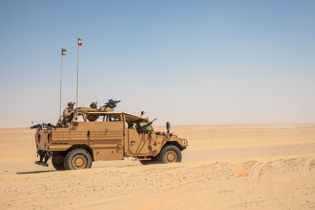 A mounted team of U.S. Marines from the 26th Marine Expeditionary Unit (SOC) and Kuwaiti Marines provide supporting fire during an integrated platoon reinforced live-fire attackat Udairi Range Complex, Kuwait, Sept. 6, 2023. Elements of the 26th MEU(SOC) conducted bilateral training with Kuwait armed forces to increase interoperability, maintain operational readiness, and strengthen relationships with partner forces. Components of the Bataan Amphibious Ready Group and 26th MEU(SOC) are deployed to the U.S. 5th Fleet area of operations to help ensure maritime security and stability in the Middle East region.