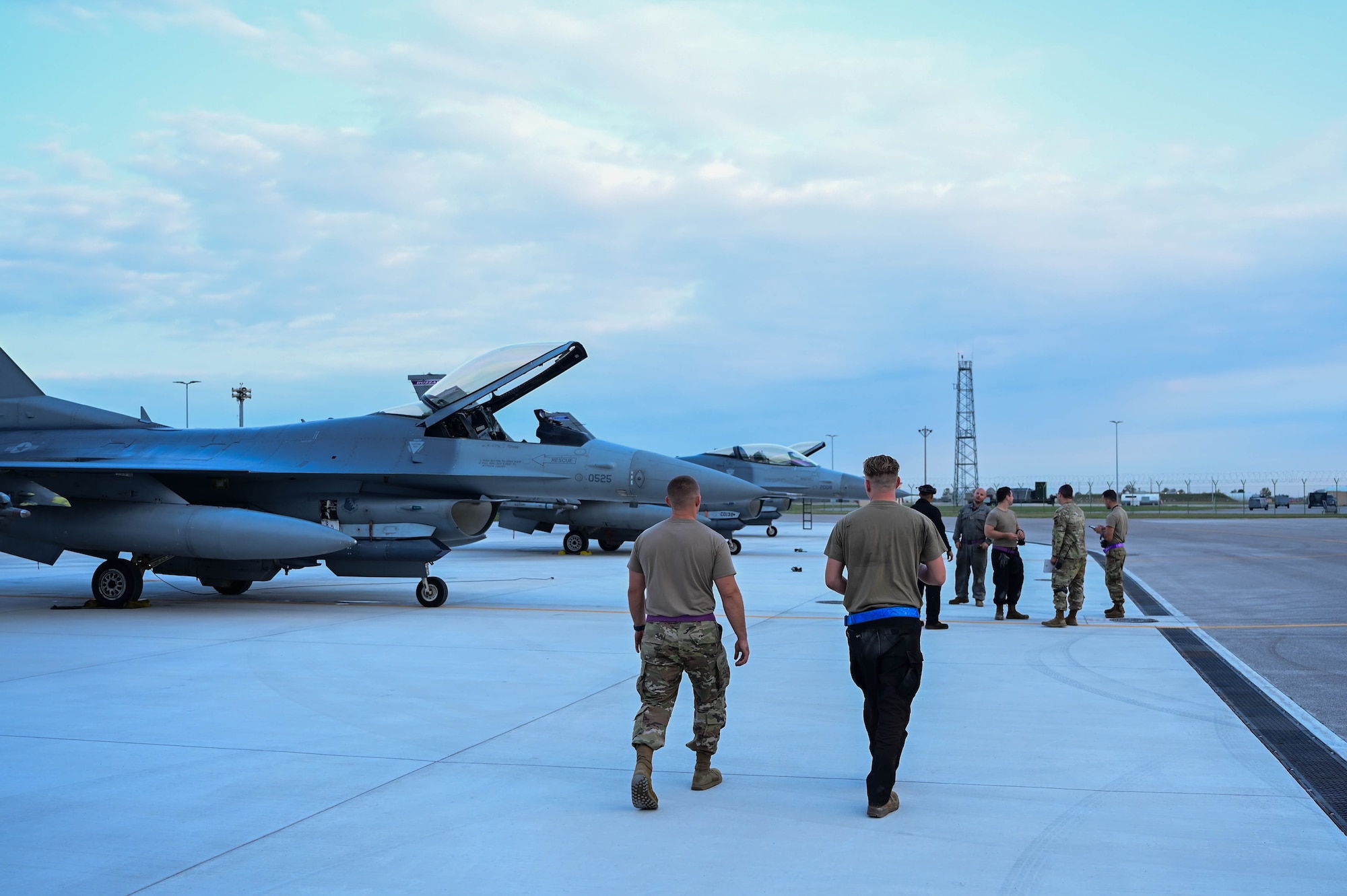 U.S. Air Force Airmen with the 510th Fighter Generation Squadron complete maintenance operations on F-16 Fighting Falcons during Exercise Purple Reign.