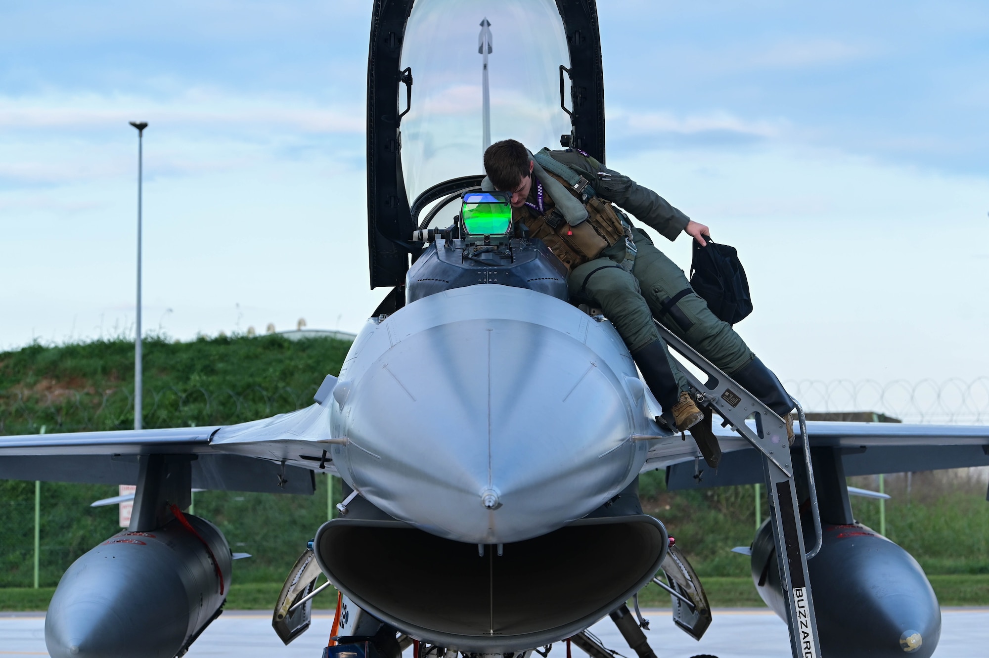 U.S. Air Force Capt. Scott “Lemme” Adams, 510th Fighter Squadron F-16 Fighting Falcon pilot, performs post-flight inspections during Exercise Purple Reign.