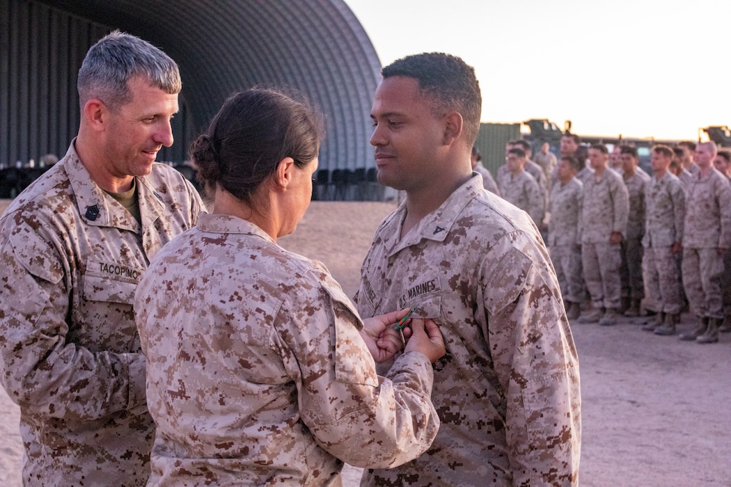 Lance Cpl. Angel Montanez, an embarkation specialist with Marine Wing Support Squadron 472, is awarded a Navy and Marine Corps Achievement Medal in a battalion formation, during Integrated Training Exercise 4-23 at Marine Air-Ground Combat Center, Twentynine Palms, CA, June 18, 2023.  Montanez a native of Canadaigua, NY and graduate of Red Jacket High School earned this award by applying his Marine Corps Martial Arts belt as a tourniquet to save a person’s life after a vehicle accident. (U.S. Marine Corps Photo by Capt. Mark Andries)