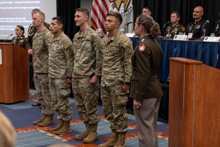 Lt. Gen. Jody Daniels promotes members of the U.S. Army Reserve Best Squad