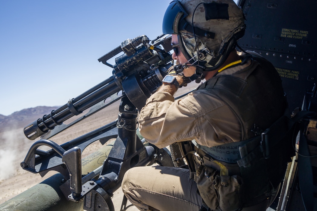 U.S. Marine Corps Staff Sgt. Keith Lohoefer, a weapons and tactics instructor with Marine Light Attack Helicopter Squadron (HMLA) 773, 4th Marine Aircraft Wing, Marine Forces Reserve conducts live fire shooting drills in a UH-1Y Venom Huey during Integrated Training Exercise (ITX) 4-23 at Marine Corps Air Ground Combat Center, Twentynine Palms, California on June 25, 2023. As the Marine Corps Reserve’s premier annual training event, ITX provides opportunities to mobilize geographically dispersed forces for a deployment; increase combat readiness and lethality; and exercise MAGTF command and control of battalions and squadrons across the full spectrum of warfare. Lohoefer is an active duty Marine and native of Woodbine, Maryland where he graduated from South Carroll High School. (U.S. Marine Corps photo by. Cpl. Ryan Schmid)