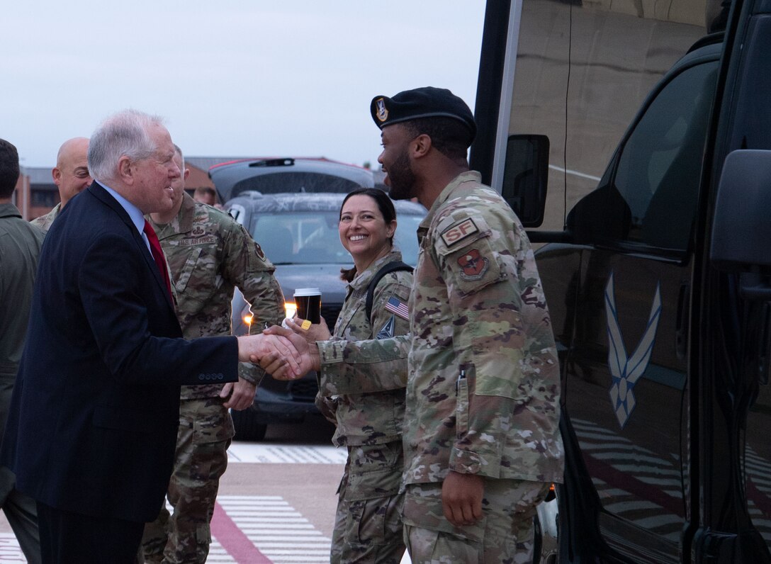 SECAF coins Tech. Sgt. Johnson during his visit.