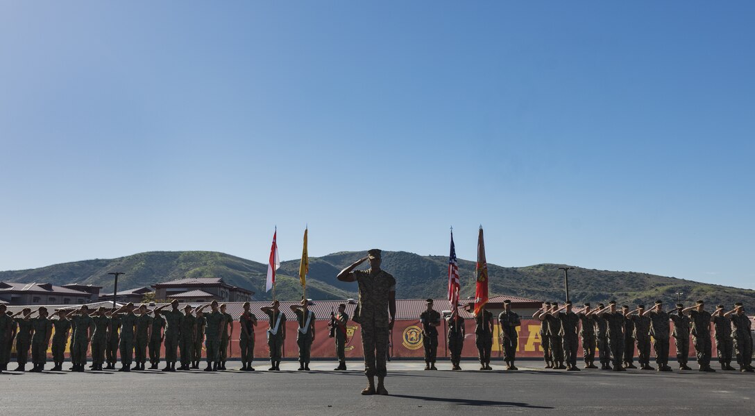 U.S. Marines with 13th Marine Expeditionary Unit, I Marine Expeditionary Force present arms during the opening ceremony for Exercise Valiant Mark 2023 at Camp Pendleton, CA, Oct. 7, 2023. Valiant Mark 23 is an annual, bilateral training exercise conducted between the Singapore Armed Forces and I Marine Expeditionary Force, designed to enhance interoperability, improve combined arms and amphibious warfighting skills, and strengthen military-to-military relationships. (U.S. Marine Corps photo by Staff Sgt. Dana Beesley)