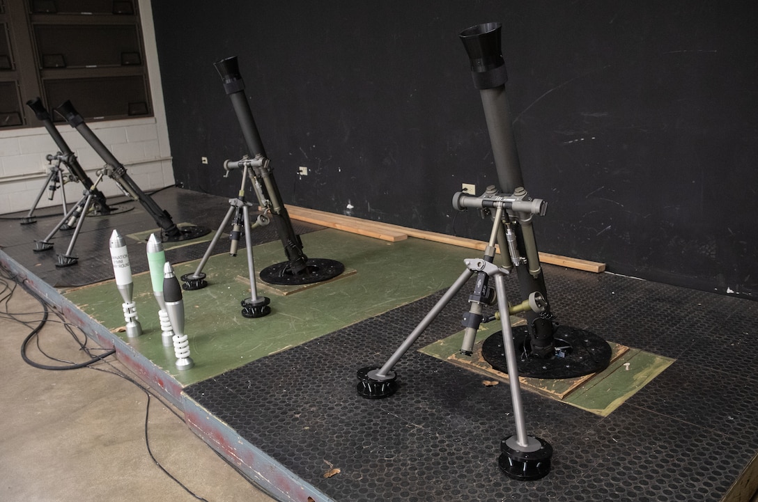 Upgraded M252 81mm mortar training systems are display at the Indoor Simulated Marksmanship Trainers, Marine Corps Base Hawaii, Aug. 25, 2023. Upgrades to the mortar ISMT will enhance simulated training by reducing firing errors and increasing the realism of the user's input to provide ultra-realistic feedback. (U.S. Marine Corps photo by Cpl. Chandler Stacy)