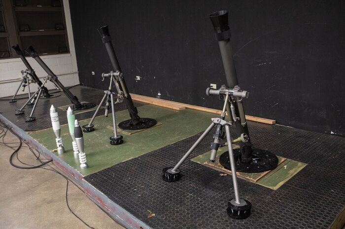 Upgraded M252 81mm mortar training systems are display at the Indoor Simulated Marksmanship Trainers, Marine Corps Base Hawaii, Aug. 25, 2023. Upgrades to the mortar ISMT will enhance simulated training by reducing firing errors and increasing the realism of the user's input to provide ultra-realistic feedback. (U.S. Marine Corps photo by Cpl. Chandler Stacy)