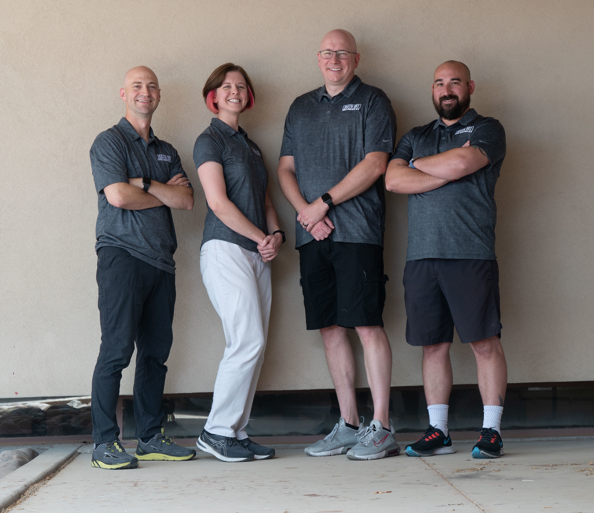 The Operational Support Team poses for a photo at Davis-Monthan Air Force Base, Ariz., Sept. 22, 2023. The OST utilized physical and mental therapy techniques to help U.S. Airmen. (U.S. Air Force photo by Airman 1st Class Robert Allen Cooke III)
