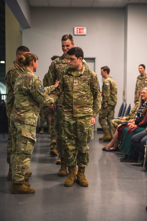  Military members shaking hands.