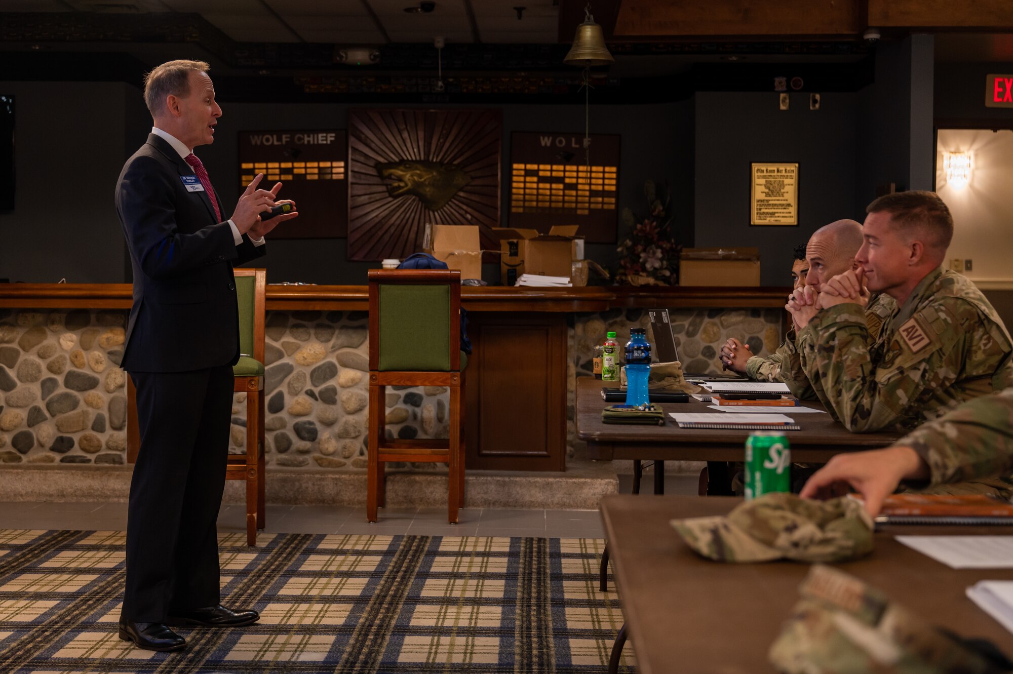 Patrick Donley delivers opening remarks to Airmen attending a Lead, Develop, Care educational course