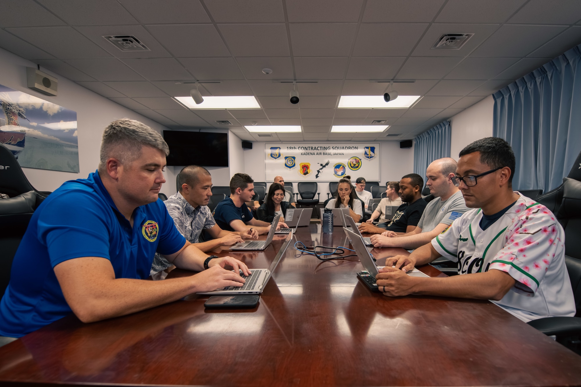 Airmen review financial documents.