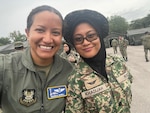 Lt. Col. Khadidja Harrell, a flight surgeon with the 194th Medical Group, poses for a photo with her Malaysian counterpart during the Indo-Pacific Military Health Exchange Sept. 26-29, 2023, in Kuala Lumpur, Malaysia. The multilateral military event focused on global health interoperability.