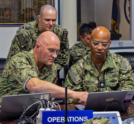 USNMRTC Yokosuka Directorate for Administration Sailors work in the Operations Control Center to help direct the more than 2,500 patients during the multi-day, joint-partner Mass Casualty Incident (MDI) training exercise.
