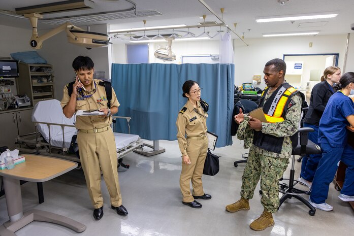 Japanese Marine Self Defense Force Sailors work together with USNMRTC Yokosuka Directorate of Training and Readiness staff to medically evacuate a simulated patient during a multi-day, joint-partner Mass Casualty Incident (MDI) training exercise held on October 3-5, 2023.
