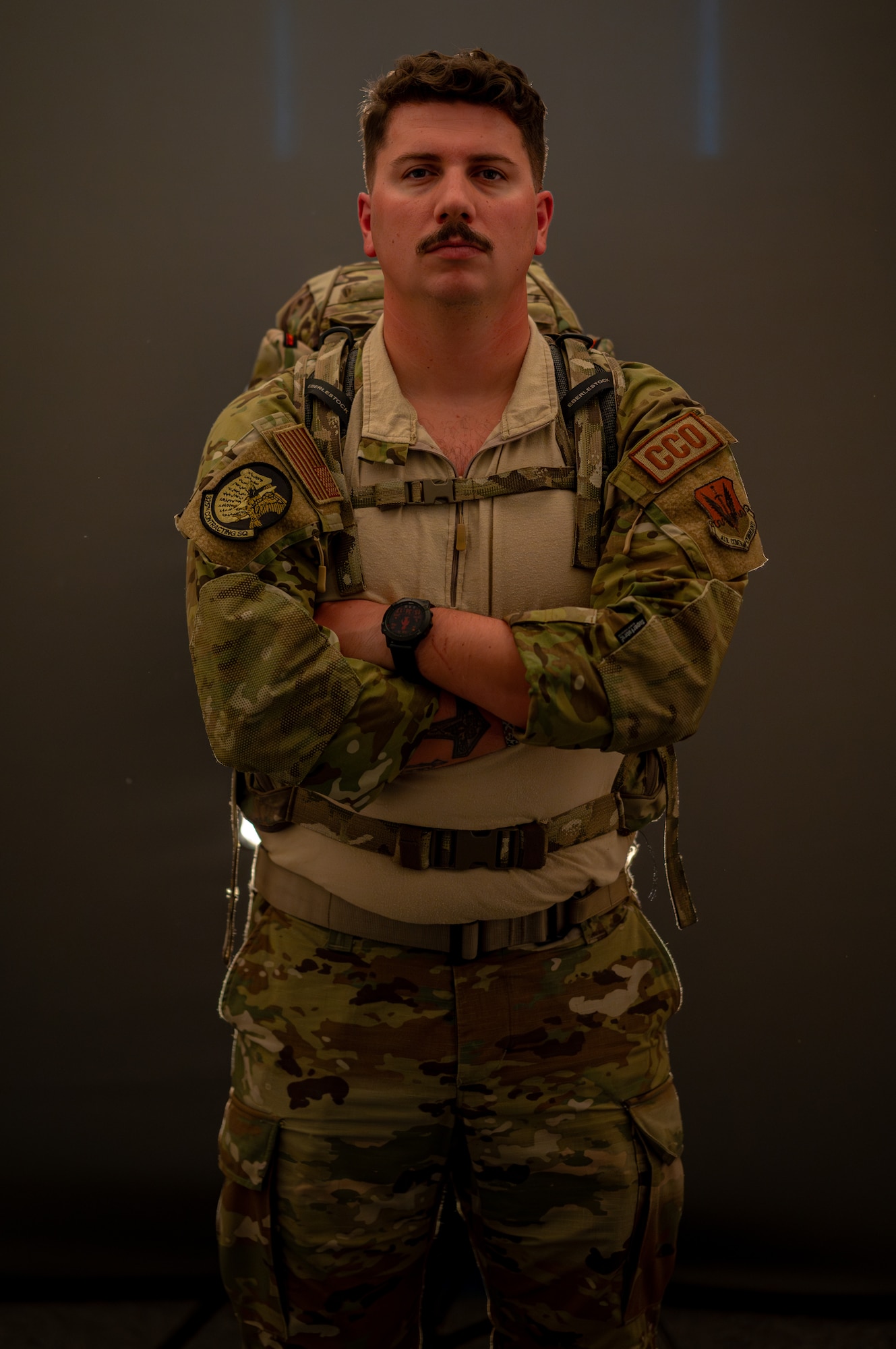 An Airman poses for a photo