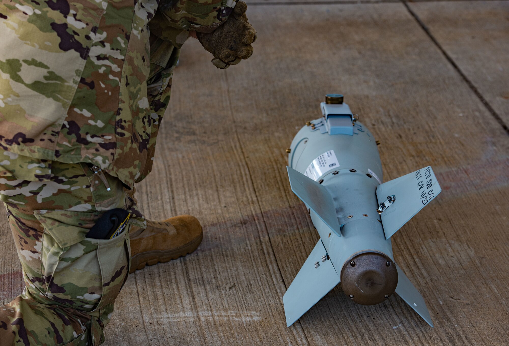 A conical fin assembly sits waiting to be attached to the munitions body at Moody Air Force Base, Georgia, Oct. 2, 2023. Conical fins house a GPS navigation system that assists the ordinance dropping at the right location. (U.S. Air Force Airman 1st Class Sir Wyrick)
