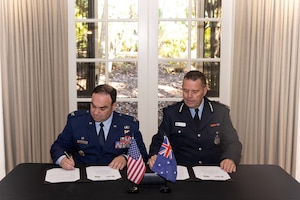 Col. Benjamin Hatch, OSI Reg. 6 commander and Australian Federal Police Assistant Commissioner Michael Pannett.
