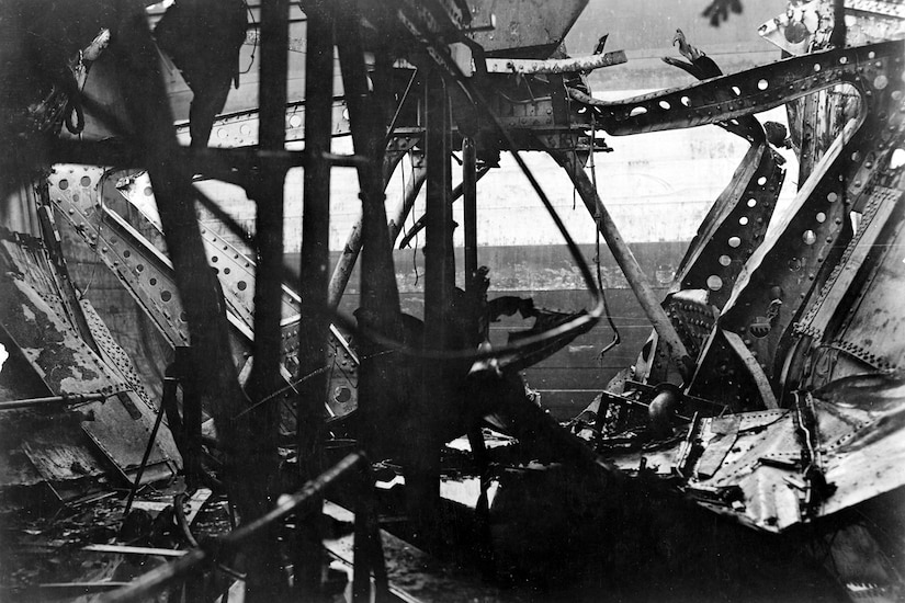 Mangled pieces of metal are what’s left of part of a ship.