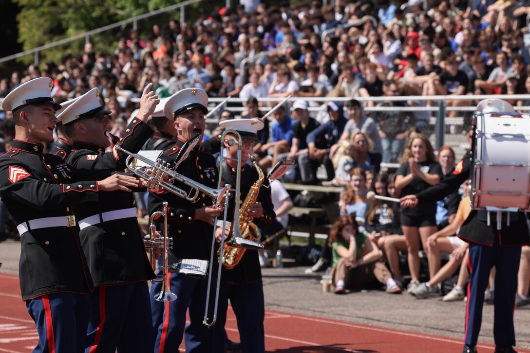 U.S. Marines with the Quantico Marine Band perform at John Glenn High School, Long Island, during Fleet Week New York (FWNY), May 26, 2023. Throughout FWNY 2023, more than 3,000 service members from the Marine Corps, Navy and Coast Guard and our NATO allies from Great Britain, Italy and Canada are engaging in special events throughout New York City and the surrounding Tri-State Region, showcasing the latest capabilities of today’s maritime services and connecting with citizens. (U.S. Marine Corps photo by Lance Cpl. David Brandes)