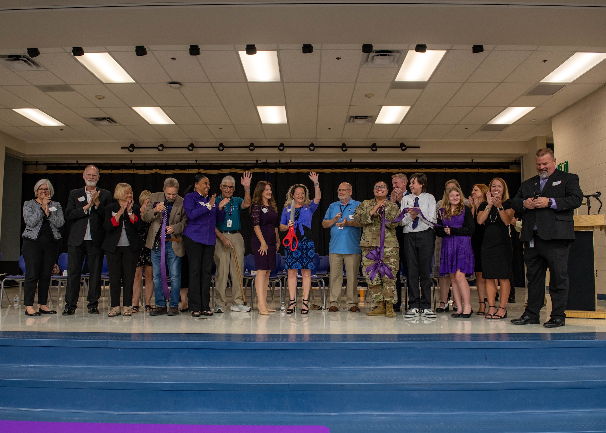 Leadership from Luke Air Force Base, along with members of the Dysart Unified School District and local community partners, celebrate Luke Elementary School being named as the first Purple Star School Candidate in the state of Arizona during a ribbon cutting ceremony Oct. 6, 2023, in Glendale, Arizona.