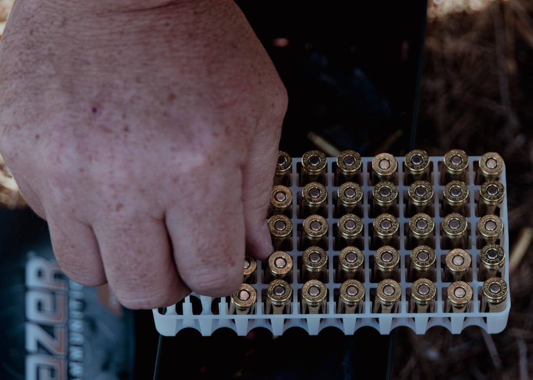 U.S. Army Sgt. Malcom Maccorgarry, a motor transport operator with 238th Transportation Company, fills magazines in preparation for the start of an annual marksmanship competition as part of San Francisco Fleet Week 23 at Wing and Barrel Ranch in San Francisco, Oct. 3, 2023. SFFW is an opportunity for the American public to meet their Navy, Marine Corps and Coast Guard teams and experience America's sea services. During fleet week, service members participate in various community service events, showcase capabilities and equipment to the community, and enjoy the hospitality of the city and its surrounding areas.