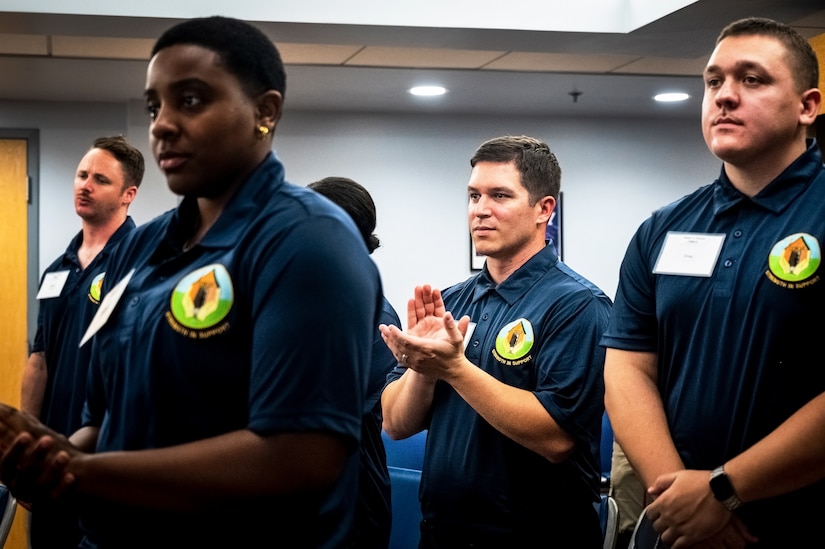 Sean's Room Peers stand in recognition during the ribbon cutting ceremony for Sean’s Room at Joint Base McGuire-Dix-Lakehurst, N.J. on 10 October, 2023. Modeled after Sean’s House, a program based in Newark, Delaware, Sean’s Room offers a safe peer-to-peer environment for JB MDL personnel to receive mental health support and maintain confidentiality as required by law. Sean’s House was originally founded by Christopher Locke after he tragically lost his son, Sean, to suicide in 2018.