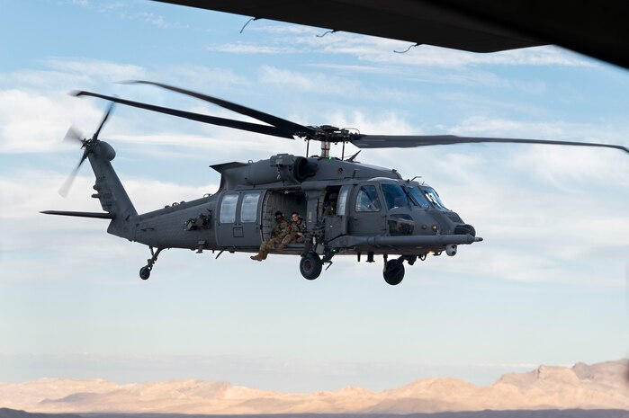 An HH-60W Jolly Green II flies over Allegiant Stadium, Las Vegas, Nevada, Oct. 9, 2023