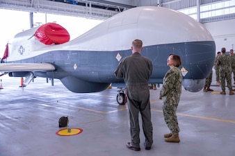 MAYPORT, Fla. (Oct. 11, 2023) – Vice Chief of Naval Operations Adm. Lisa Franchetti sees an MQ-4C Triton Unmanned Aircraft System while visiting Naval Station Mayport, Oct. 11. Franchetti and Master Chief Petty Officer of the Navy James Honea visited Naval Station Mayport, Naval Air Station Jacksonville, and Naval Air Station Key West to engage with Sailors and to observe the U.S. Navy’s Hybrid Fleet event. (U.S. Navy photo by Chief Mass Communication Specialist Amanda R. Gray)