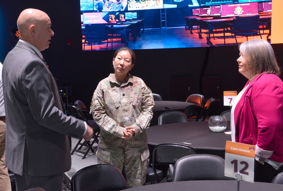 16th Air Force technical director speaks to more than 100 attendees about cyber threats at Cyber Horizons event.