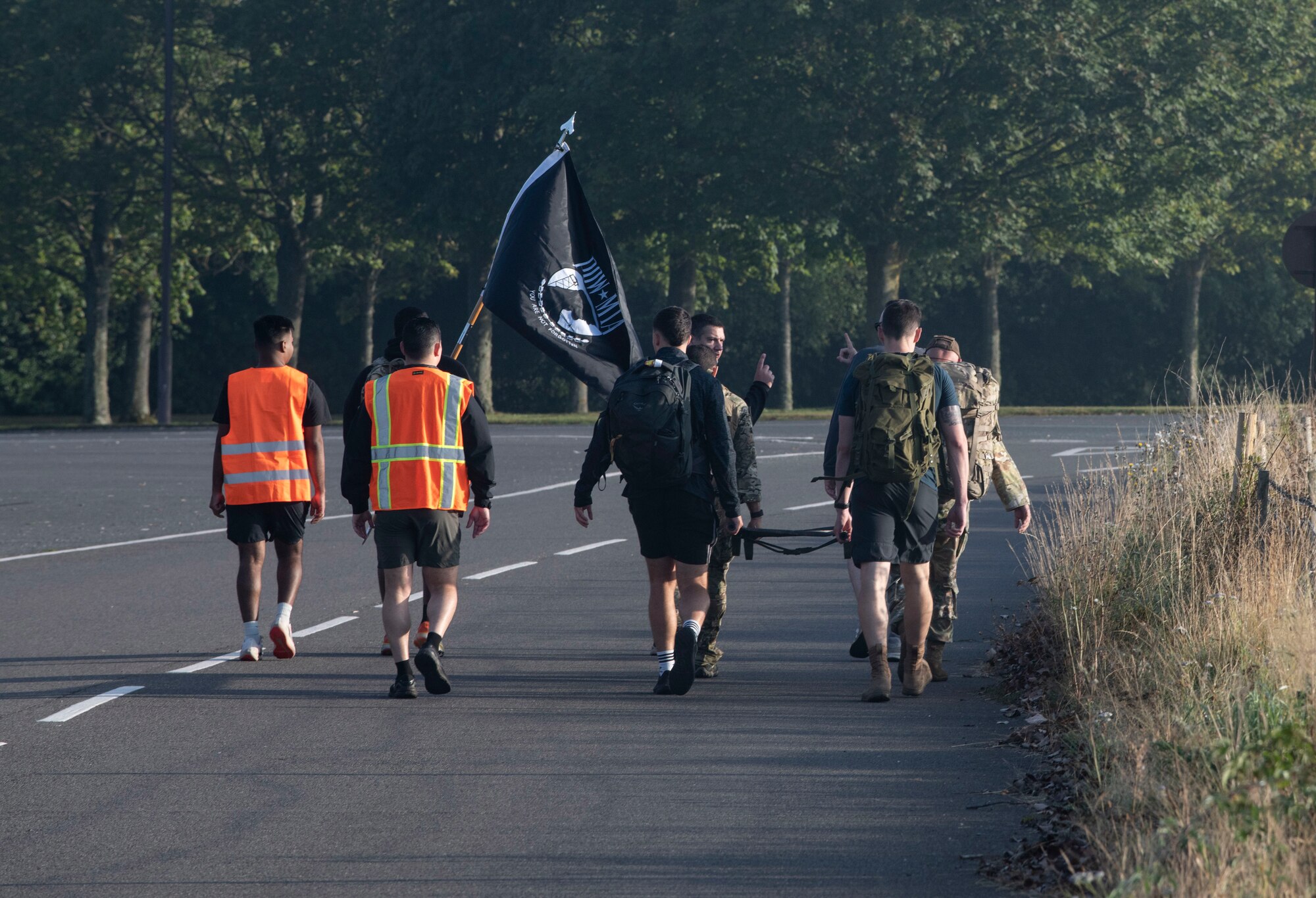 Airmen from the 422d Air Base Group participate in a 5K run/ruck in observance of National POW/MIA Recognition Day at RAF Croughton