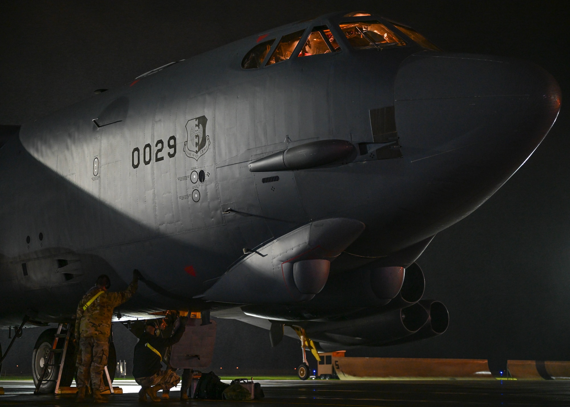 Minot Airmen perform pre-flight procedures on a B-52H Stratofortress at Minot Air Force Base, North Dakota, Oct. 3, 2023. Aircraft maintainers and aircrew conduct operations at all hours of the day to ensure B-52s are prepared to fly at a moment’s notice. (U.S. Air Force photo by Airman 1st Class Kyle Wilson)