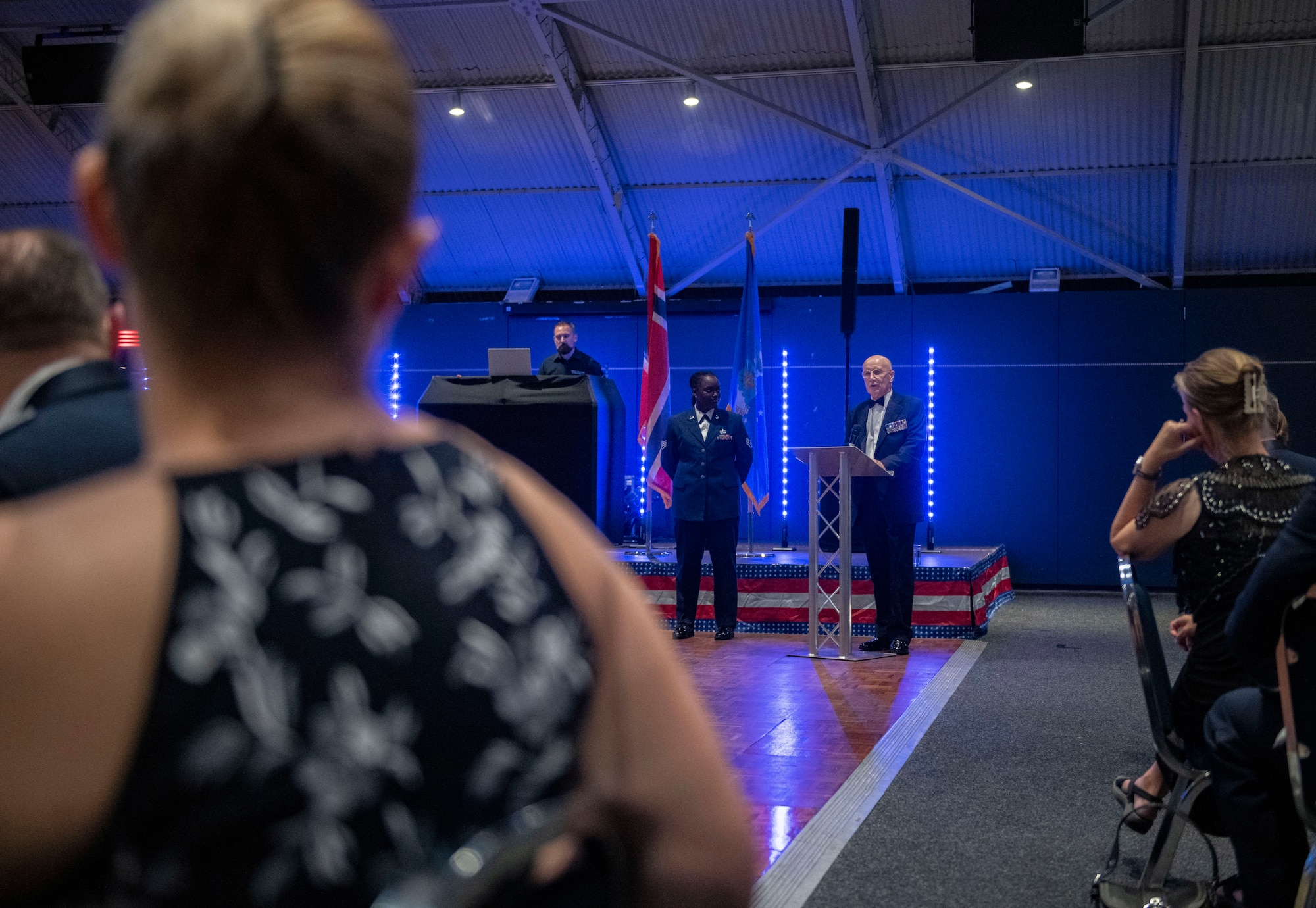 Warrant Officer 1st Class (RET) John Martin O’Kelly, center right, speaks at Sywell Aerodrome