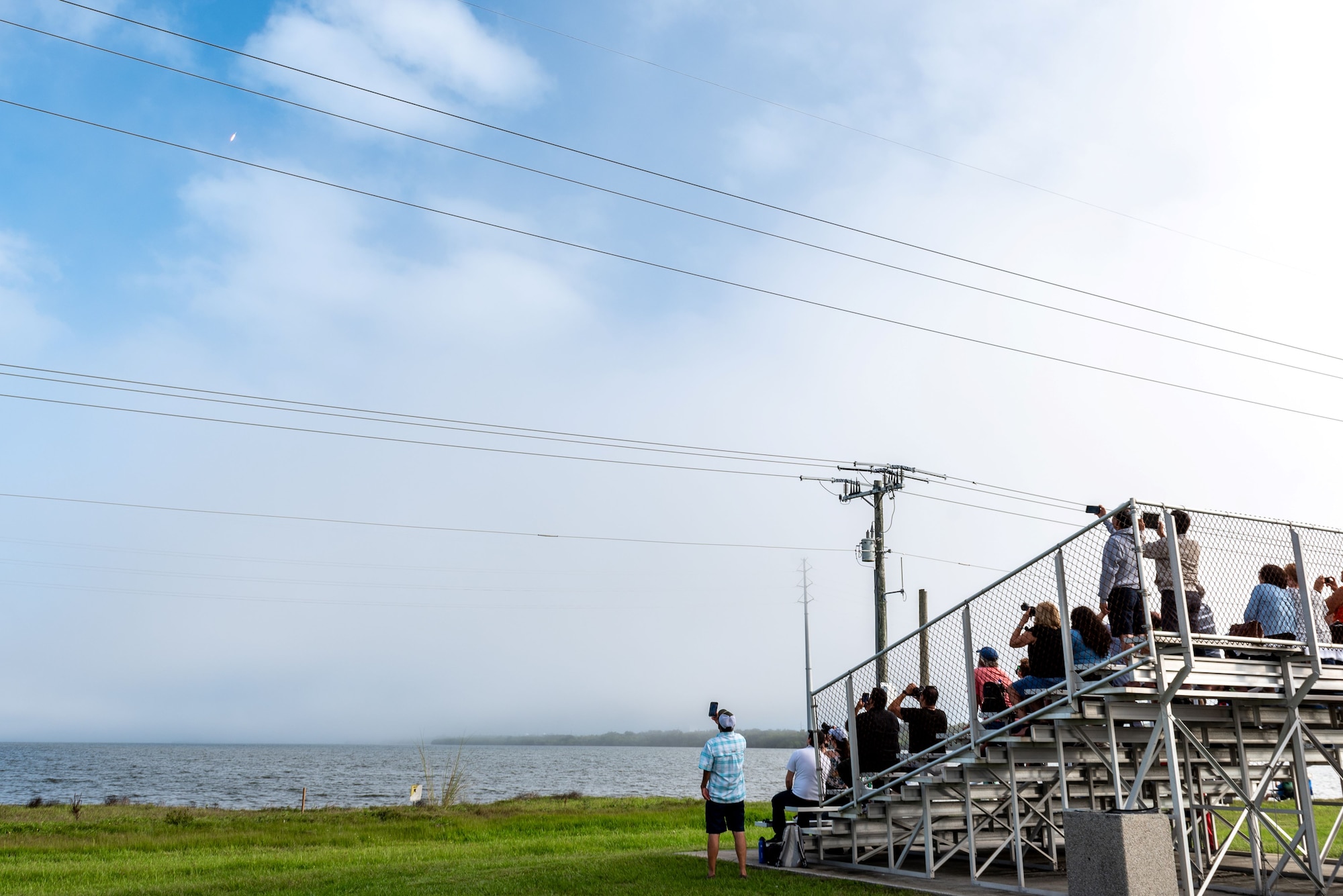 Spectators watch from the South Gate Viewing Area as USSF-44 launches from Cape Canaveral Space Force Station.