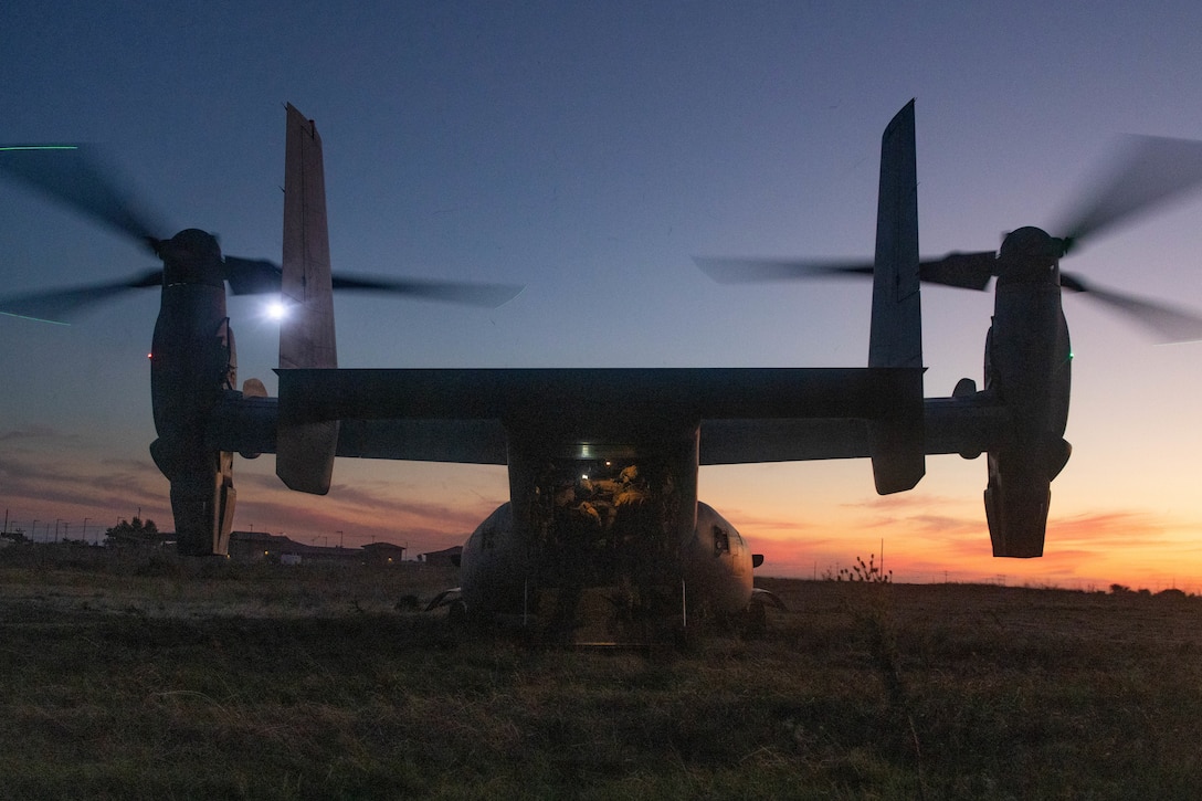 U.S. Marines with 1st Reconnaissance Battalion, 1st Marine Division, and members of 2nd Battalion, Royal Australian Regiment, load onto an MV-22B Osprey at Marine Corps Base Camp Pendleton, California, Sept. 26, 2023. Members of 2RAR worked alongside 1st Recon Bn. to execute a reconnaissance and surveillance insert from Camp Pendleton to Marine Corps Air Ground Combat Center Twentynine Palms, California, as part of a bilateral training exercise developed to strengthen the relationship, mission readiness and interoperability between 2RAR and 1st Recon Bn. (U.S. Marine Corps photo by Sgt.  Taylor)