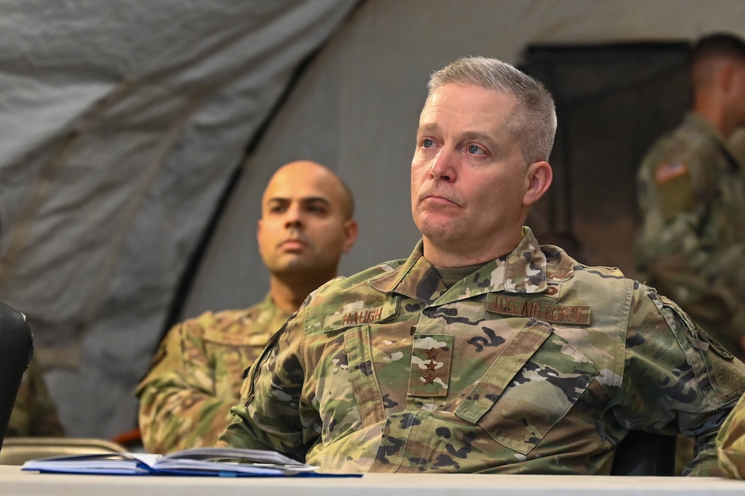 U.S. Air Force Lt. Gen. Timothy Haugh, deputy commander of United States Cyber Command, is briefed on the mission of Joint All Domaine Exercise, Forward Operation Readiness Generation Exercise at Goodfellow Air Force Base, Texas, Oct. 10, 2023. JADE FORGE provides a variety of scenarios preparing students for combat against near-peer adversaries. (U.S. Air Force photo by Airman 1st Class Zach Heimbuch)
