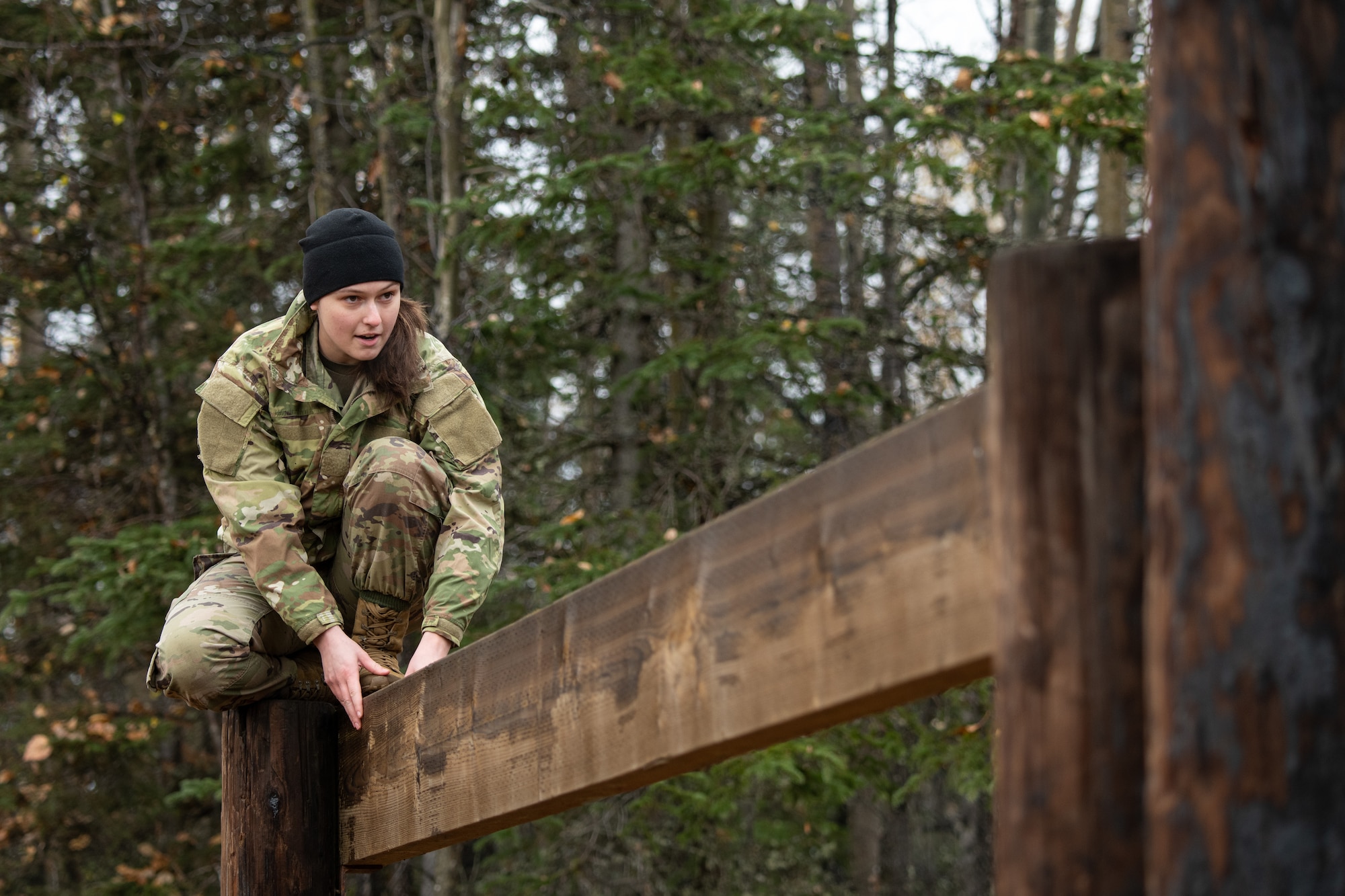 U.S. Army Soldiers assigned to the 95th Chemical Company, 17th Combat Sustainment Support Battalion, 2nd Infantry Brigade Combat Team (Airborne), 11th Airborne Division, compete in an obstacle course at Joint Base Elmendorf-Richardson, Alaska, Oct. 5, 2023.
