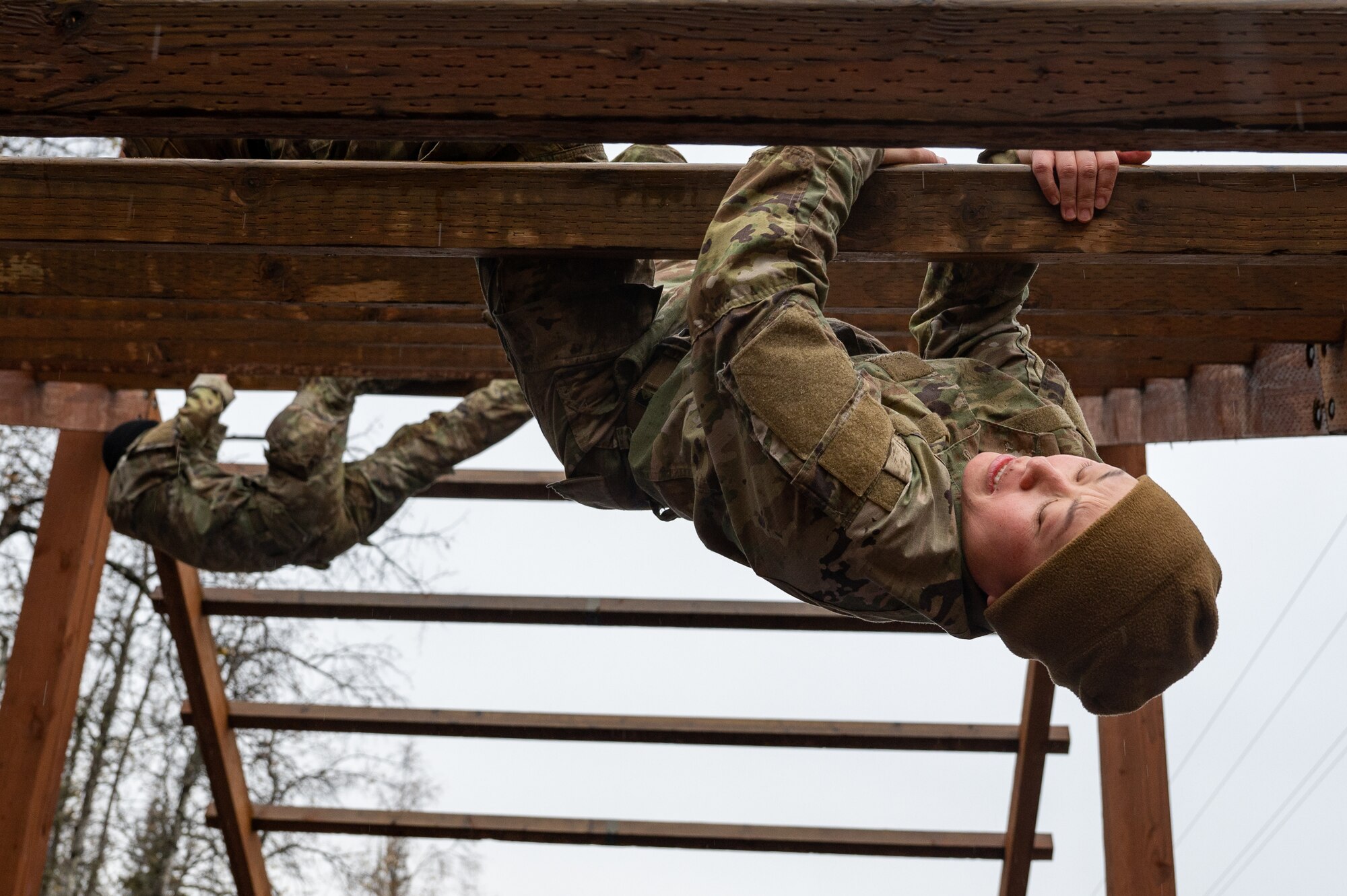 U.S. Army Soldiers assigned to the 95th Chemical Company, 17th Combat Sustainment Support Battalion, 2nd Infantry Brigade Combat Team (Airborne), 11th Airborne Division, compete in an obstacle course at Joint Base Elmendorf-Richardson, Alaska, Oct. 5, 2023.