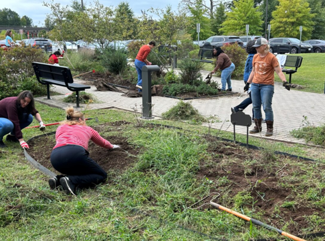 Army Reserve Soldiers, Civilian employees, and Families volunteer to weed, plant, and mulch pollinator gardens at the Office of the Chief, Army Reserve, on 29 September at Fort Belvoir, Va. The revitalization of the garden, as well as its initial install in 2017, was funded through a National Environmental Education Foundation (NEEF) grant for National Public Lands Day.