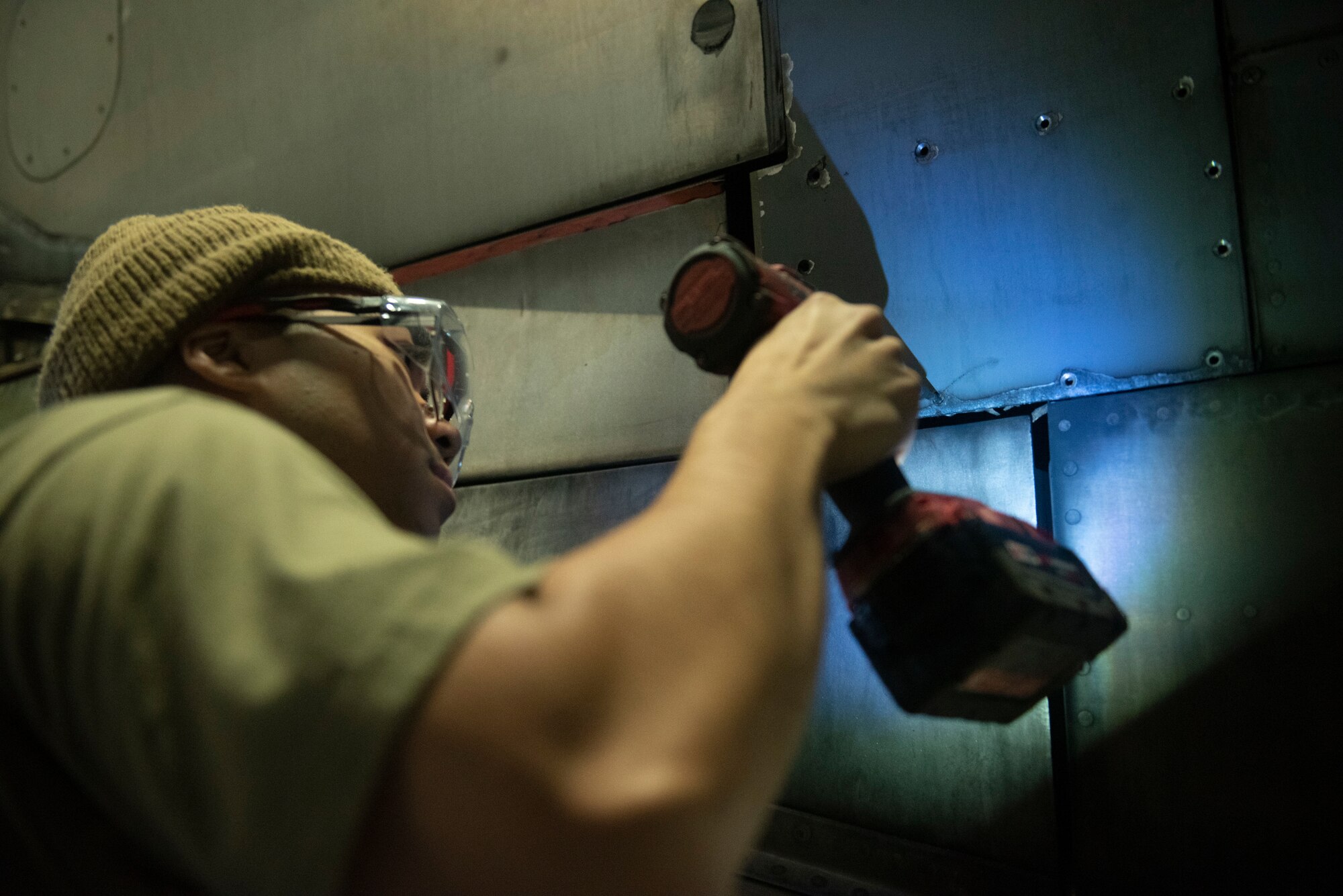 Maintainers with the 62d AMXS and MXS worked together to disassemble and remove a damaged engine and replace it with a serviceable one. (U.S. Air Force photo by Airman 1st Class Kylee Tyus)