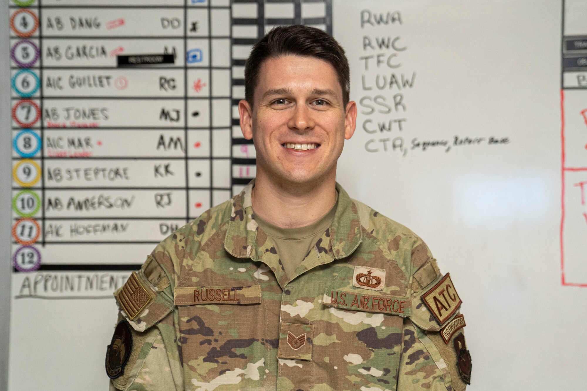 U.S. Air Force Staff Sgt. Michael Russell, 334th Training Squadron air traffic control instructor, poses for a photo at Keesler Air Force Base, Mississippi, Sept. 26, 2023.
