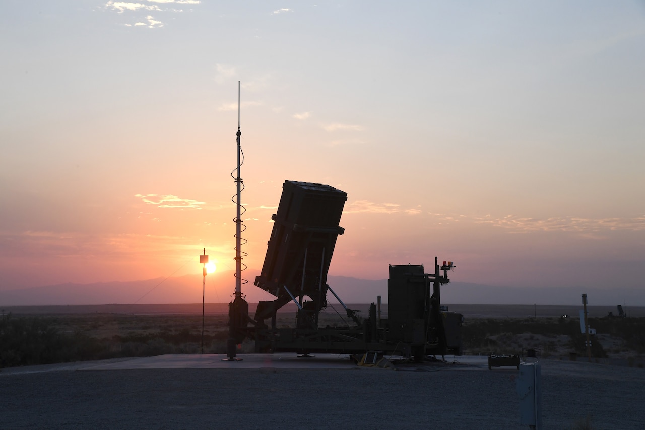 A rocket launcher is photographed in the desert.