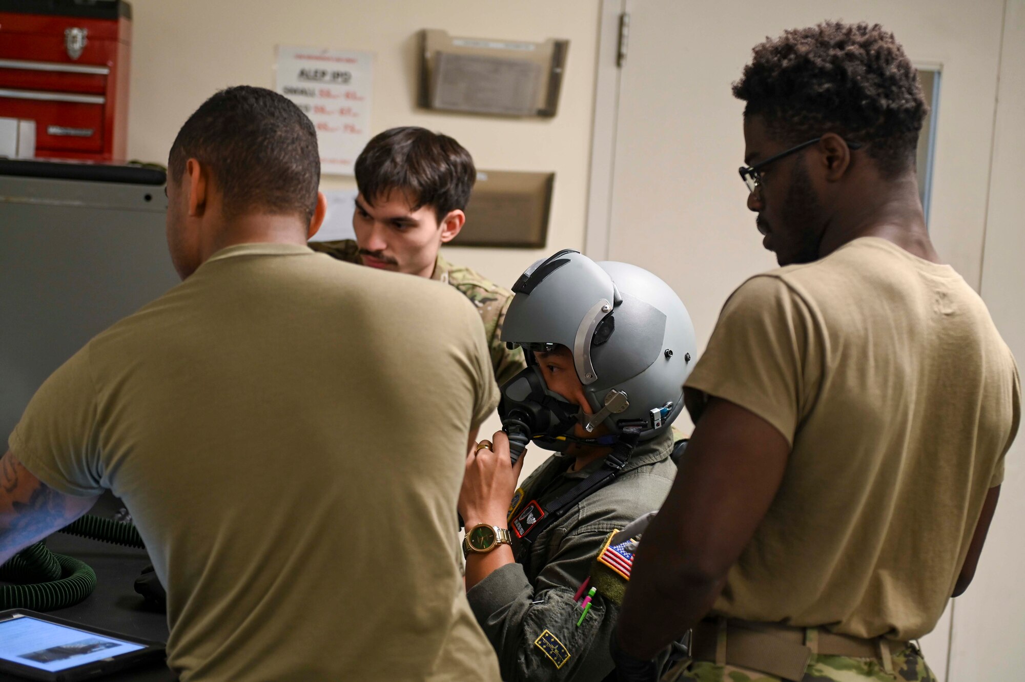 An Airman tries on a mask at an AFE mask fitting.