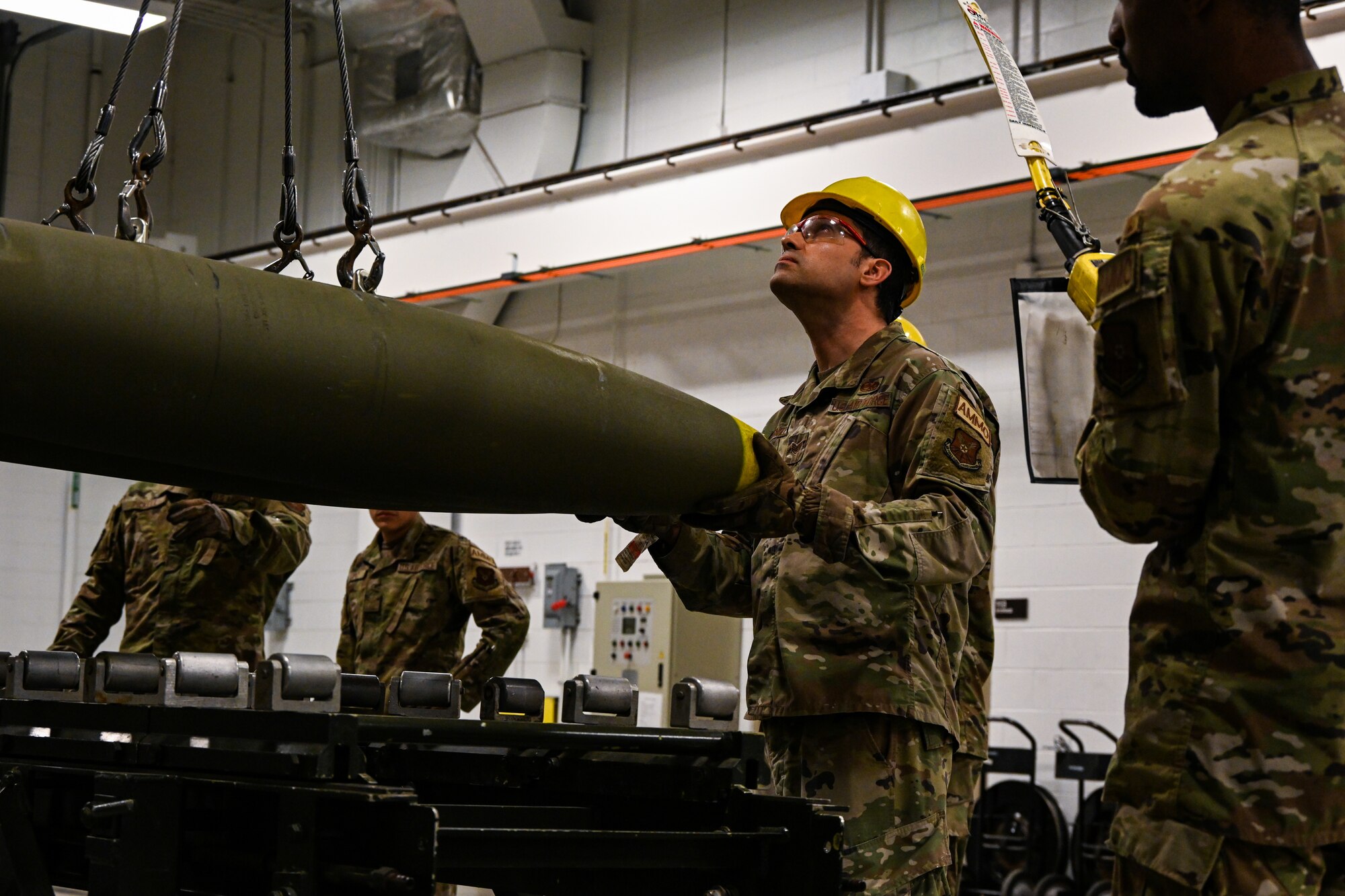 U.S. Air Force Staff Sgt. Kenneth Hignite, 5th Munitions Squadron munitions stockpile crew chief, prepares an Mk-82 ordnance during Operation Tundra Swan at Minot Air Force Base, North Dakota, Oct. 2, 2023. Because the Mk-82 is a free-fall ordnance, its accuracy depends on the platform or pilot delivering it. (U.S. Air Force photo by Airman 1st Class Alyssa Bankston)