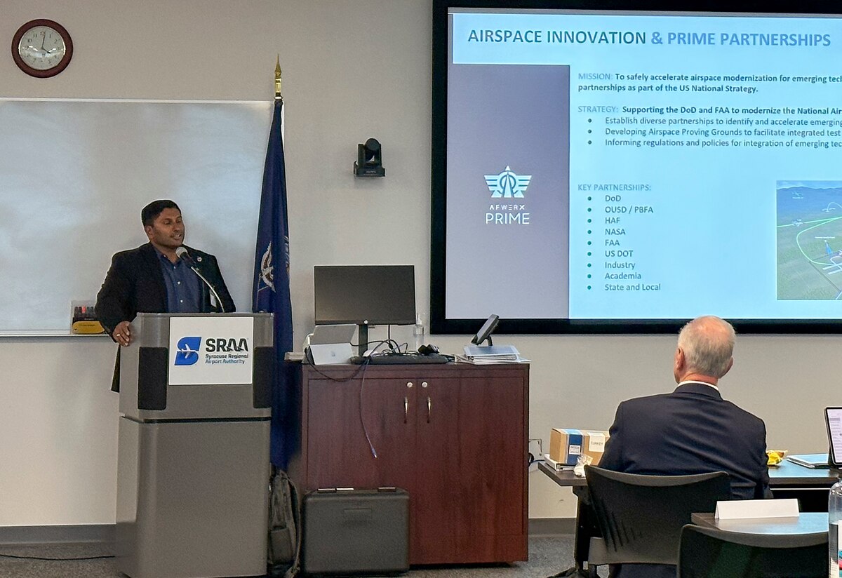 Darshan Divakaran, AFWERX head of Airspace Innovation and Prime Partnerships, briefs at the U.S. Department of Transportation’s Advanced Air Mobility Interagency Working Group at the Syracuse Hancock International Airport, New York, Oct. 11-13. (U.S. Air Force photo by Ciska Bloemhard)