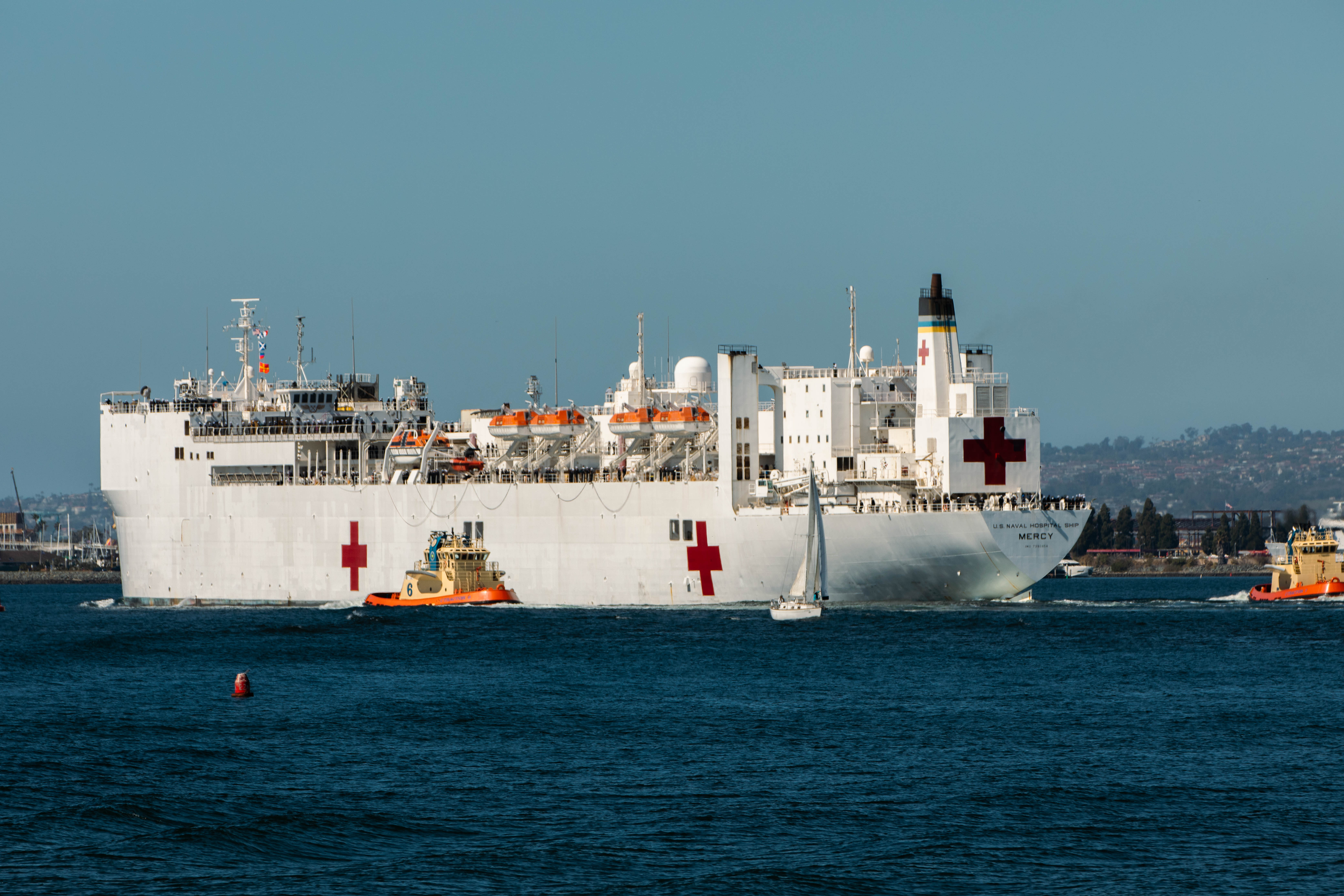 The hospital ship USNS Mercy (T-AH 19) gets underway in support of Pacific Partnership 2024-1 from Naval Base San Diego, Oct. 10, 2023. Pacific Partnership, now in its 18th iteration, is the largest multinational humanitarian assistance and disaster relief preparedness mission conducted in the Indo-Pacific and works to enhance regional interoperability and disaster response capabilities, increase security stability in the region, and foster new and enduring friendships. (U.S. Navy photo by Mass Communication Specialist Seaman Apprentice Pimpaka Kruthun)