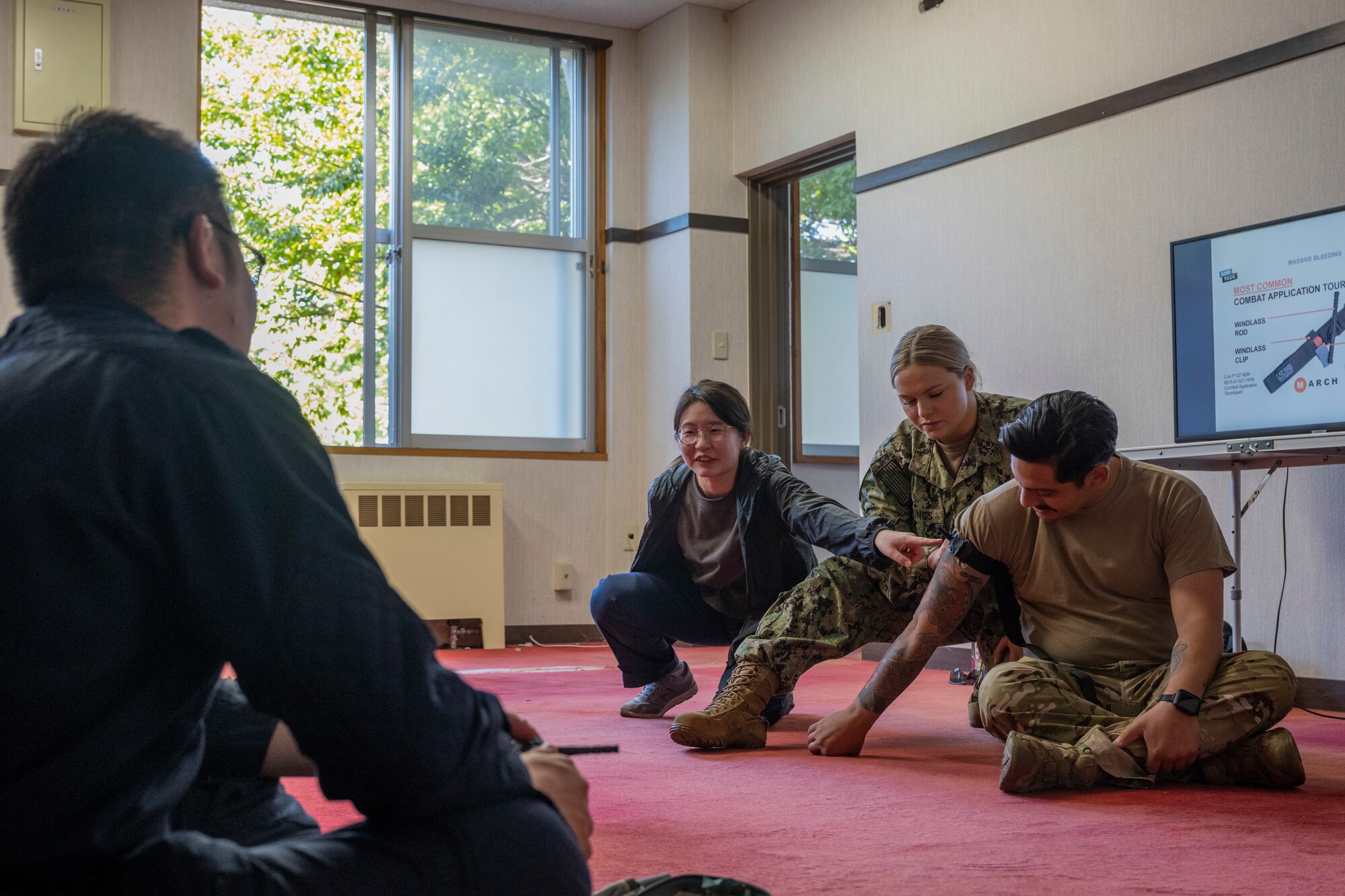 A sailor performs medical training.