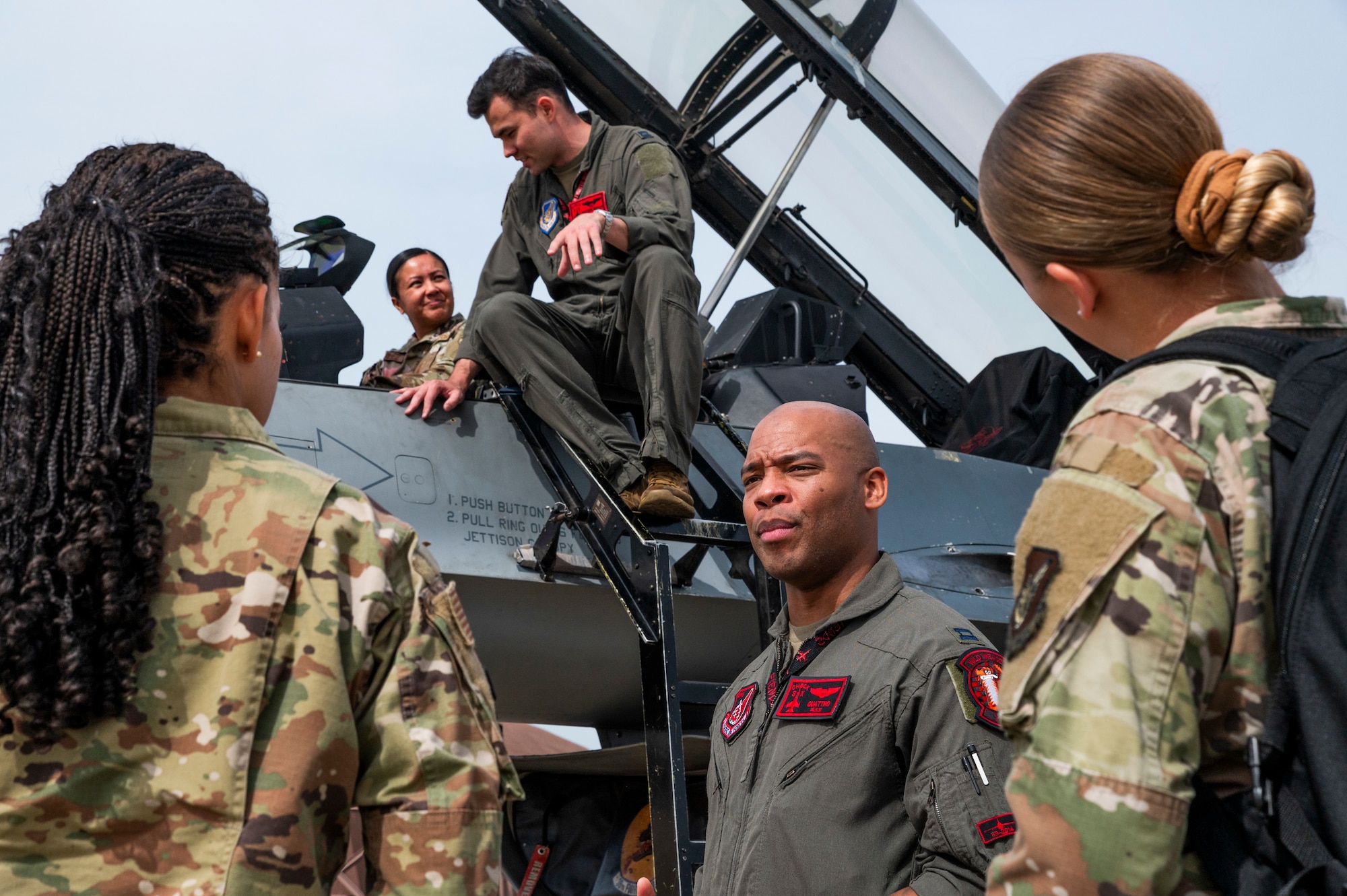 U.S. Air Force pilots assigned to the 36th Fighter Squadron showcase the F-16 Fighting Falcon during a tour at Osan Air Base, Republic of Korea, Oct. 6, 2023.